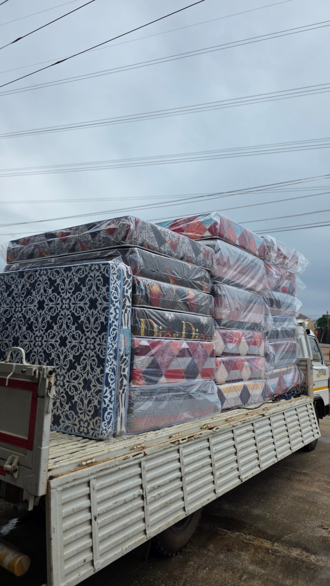 Packaged mattresses loaded for delivery